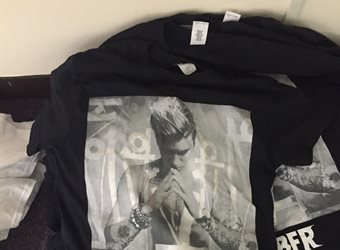 One-of-the-counterfeit-t-shirts-sold-at-the-Justin-Bieber-concert