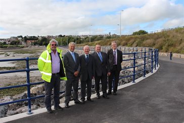 Vale of Glamorgan Council Leader John Thomas is joined by Cllr Jonathan Bird, Cllr Geoff Cox and Council officers at the newly-opened Harbour Road Causeway