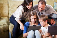 Family-of-four-on-sofa