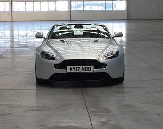 Aston Martin parked in hanger