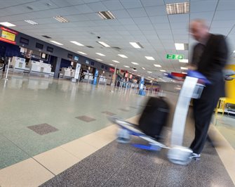 Cardiff Airport arrival and business man © Crown copyright 2017 (Business Wales)