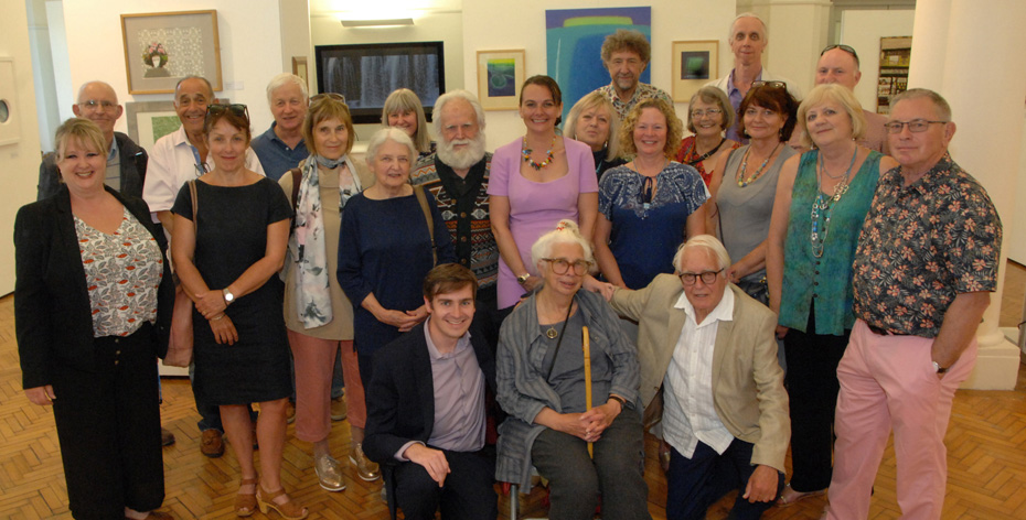 Cllr Kathryn McCaffer with artists at exhibition banner size