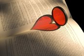 Heart reflected onto a book