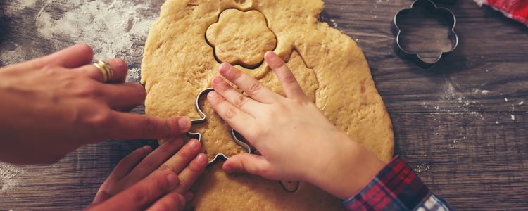 Family making biscuits