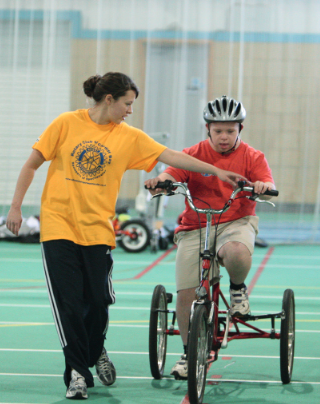 Child on tricycle