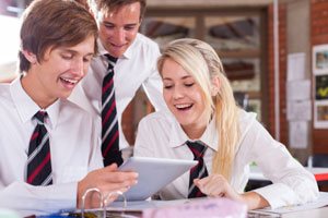 Secondary school pupils using a tablet device