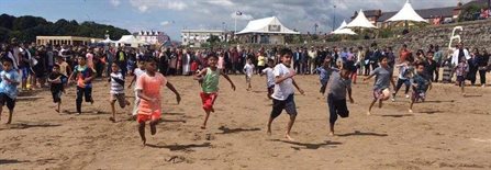 Children enjoying Barry Island beach