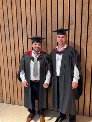 Sam and Callum at their graduation
