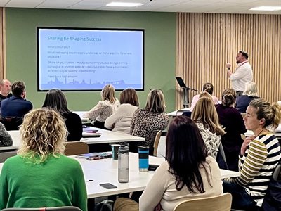 Group of colleagues at management development sessions