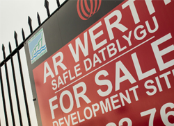 Sale-sign on fence