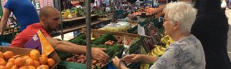 Woman buying produce
