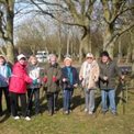 Group of nordic walkers with their walking poles