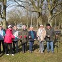 Group of nordic walkers with their walking poles